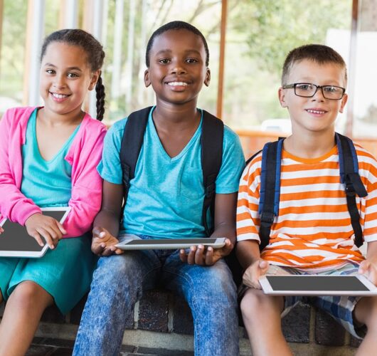 group of elementary students smiling