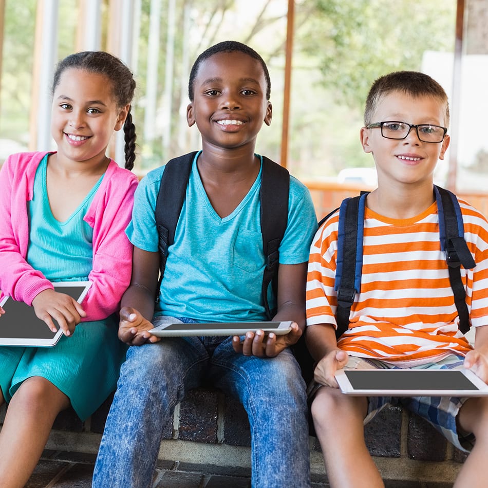 group of elementary students smiling